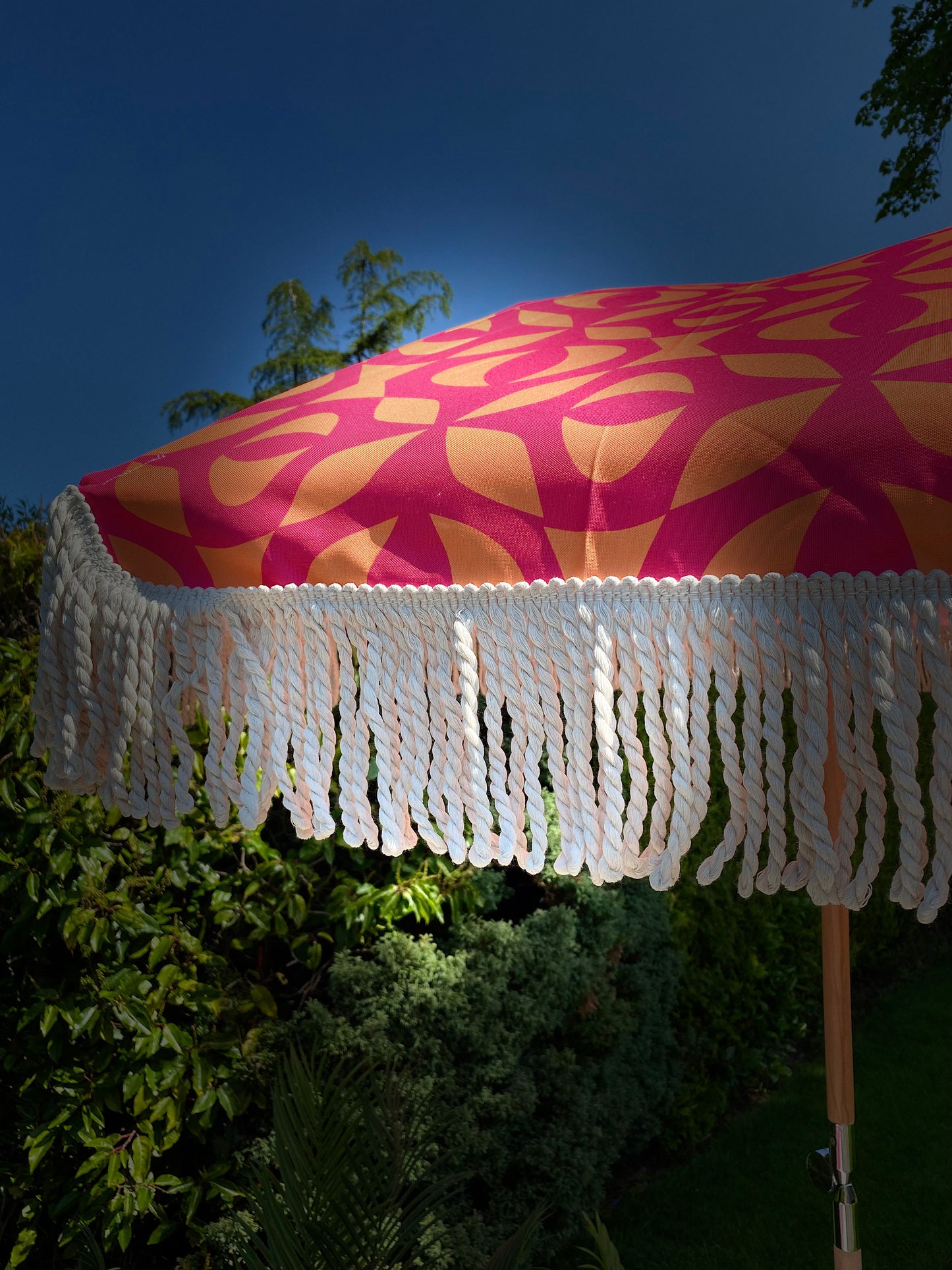 close up pink fuscia parasol umbrella