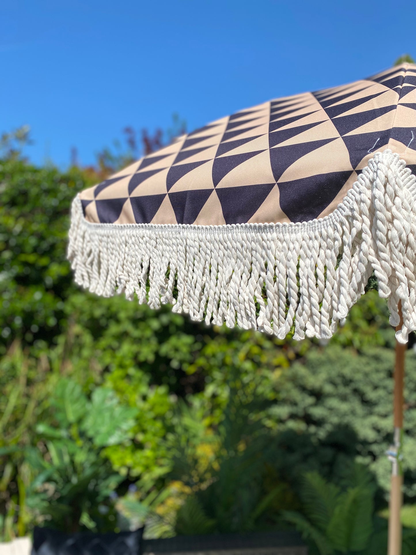 close up print triangle design black and beige umbrella