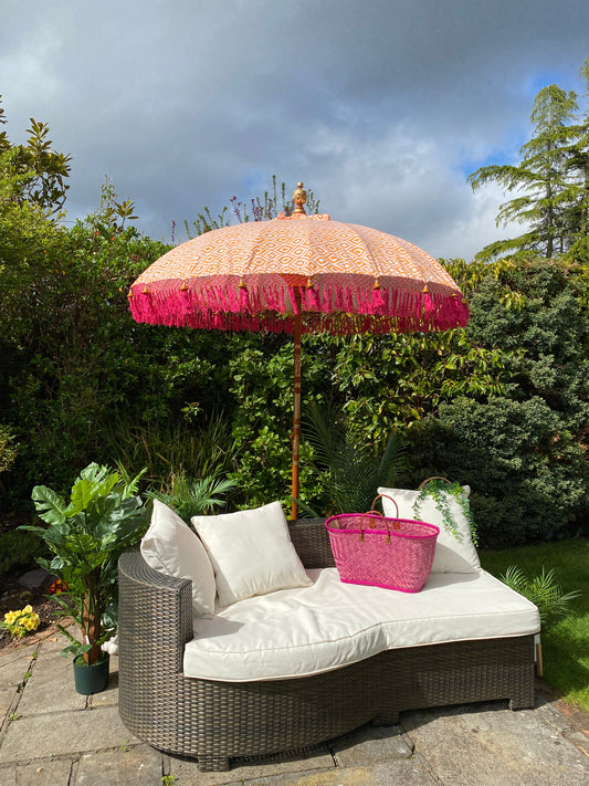orange geometric print bali parasol with pink fringe