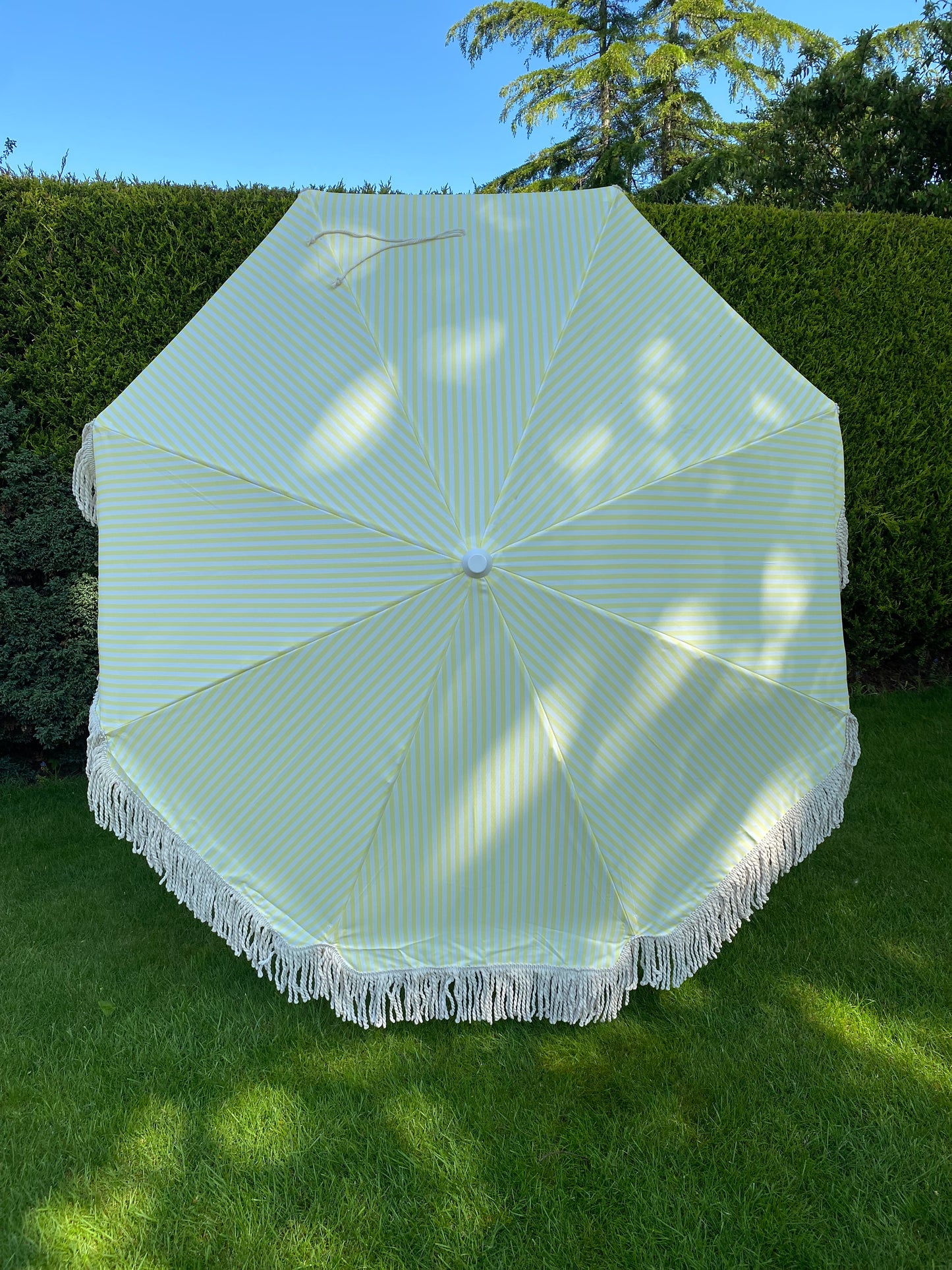 close up image of parasol canopy large sun garden umbrella