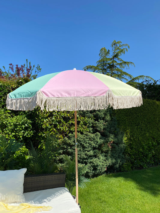 pastel pink green green and yellow boho parasol with fringe