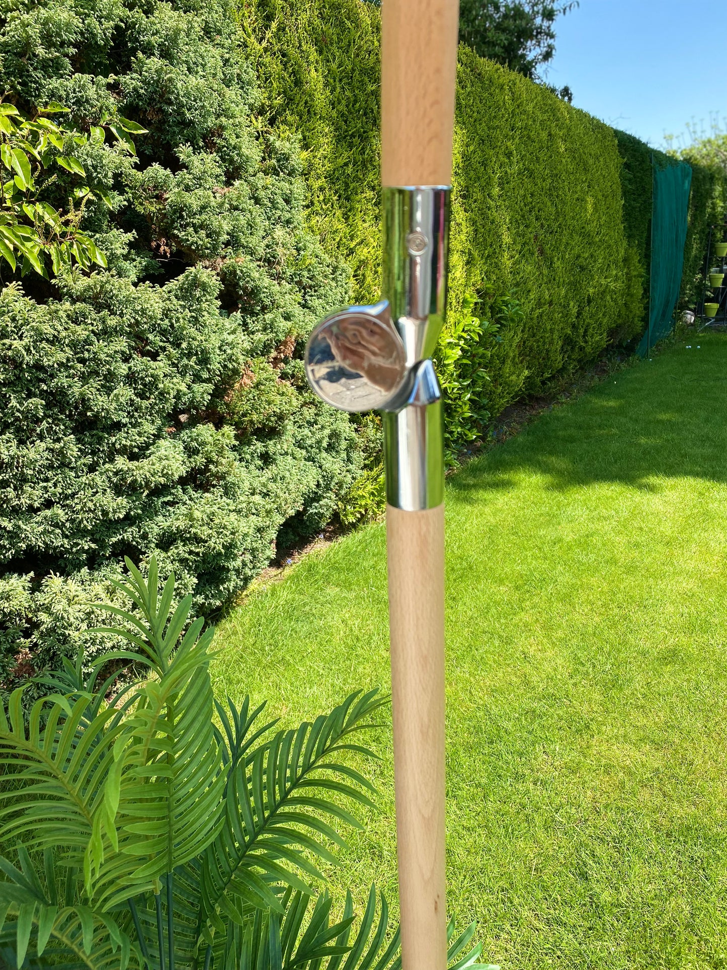 close up image of product pole tilt lever function of parasol