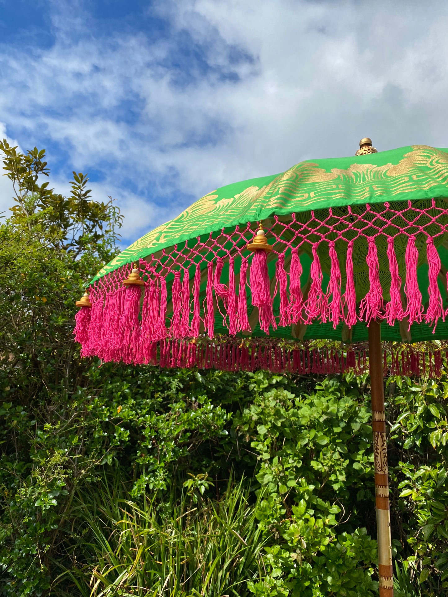 green and pink bali parasol