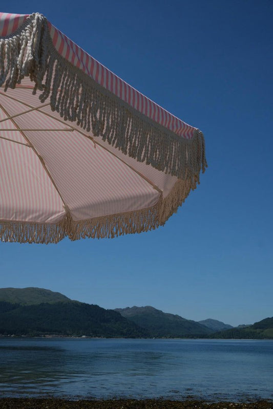 pink and white boho umbrella fringe