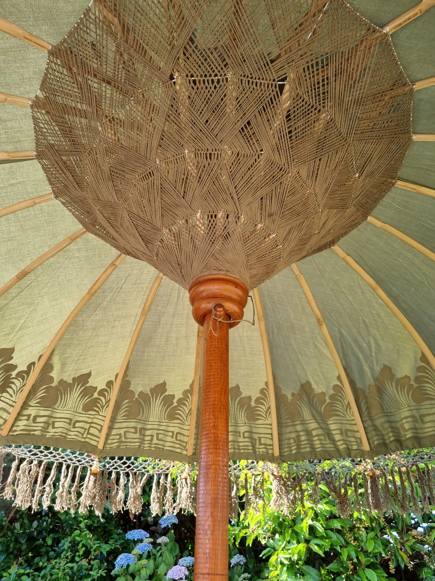 green bali sun umbrella inside canopy picture