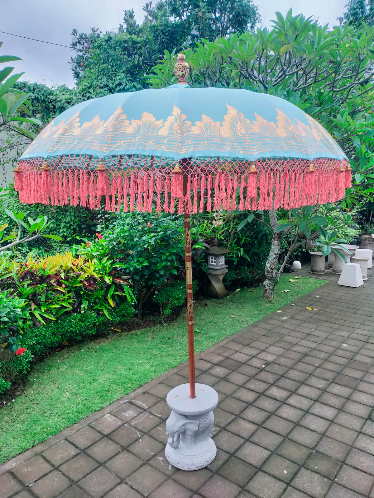 mint green blue bali parasol umbrella with peach tassels