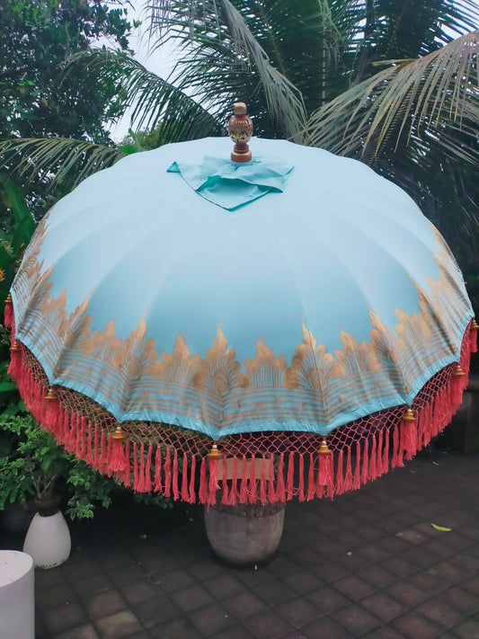 close up bali parasol blue green and peach
