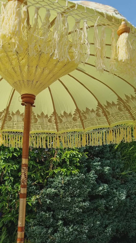Close up balinese fringe detail parasol umbrella video
