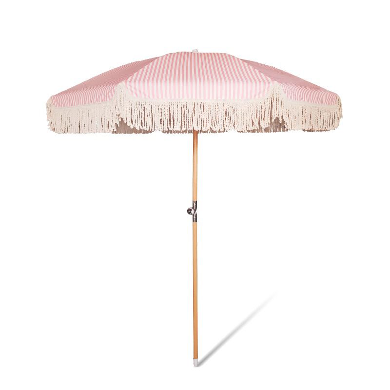 Still life image pink and white striped vintage parasol sun garden